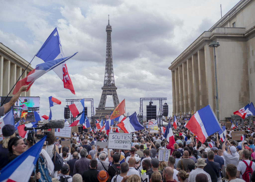 French parliament approves restaurant COVID pass and vaccine rules despite protests